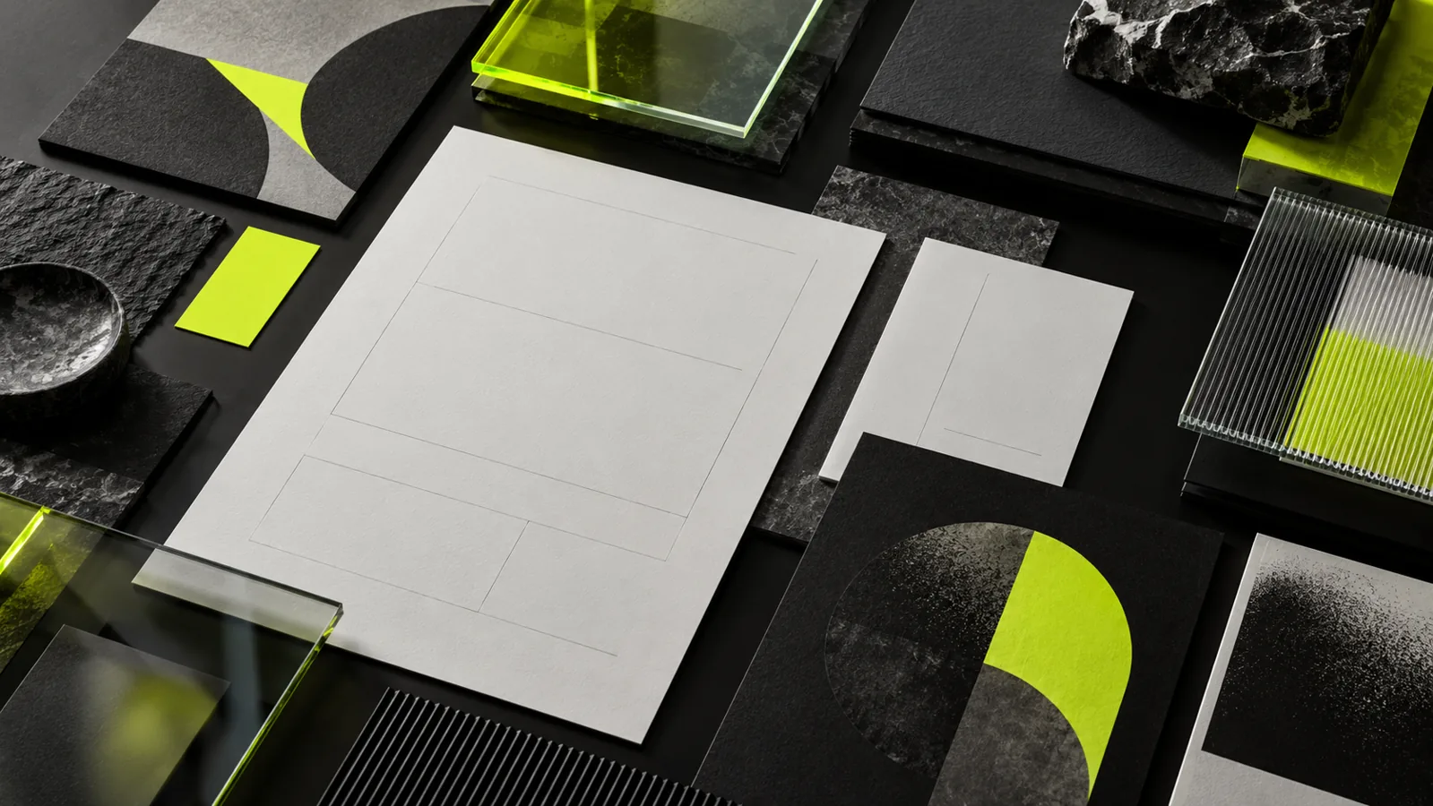 Graphic layout sheets, printed shapes, and material samples